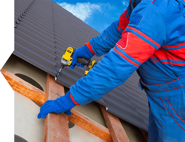 A Man Installin a Roof With a Drill