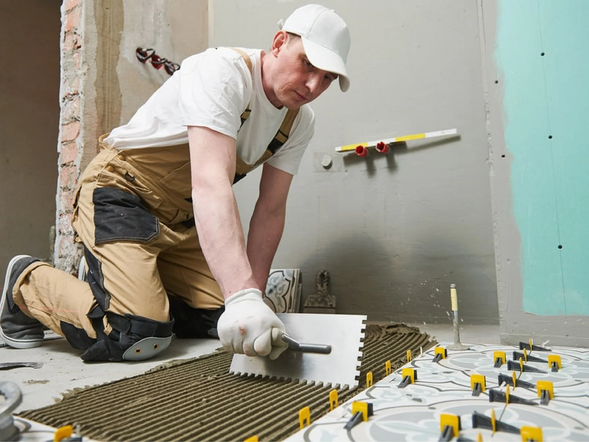 Flooring installer using product knowledge and technical support on the jobsite