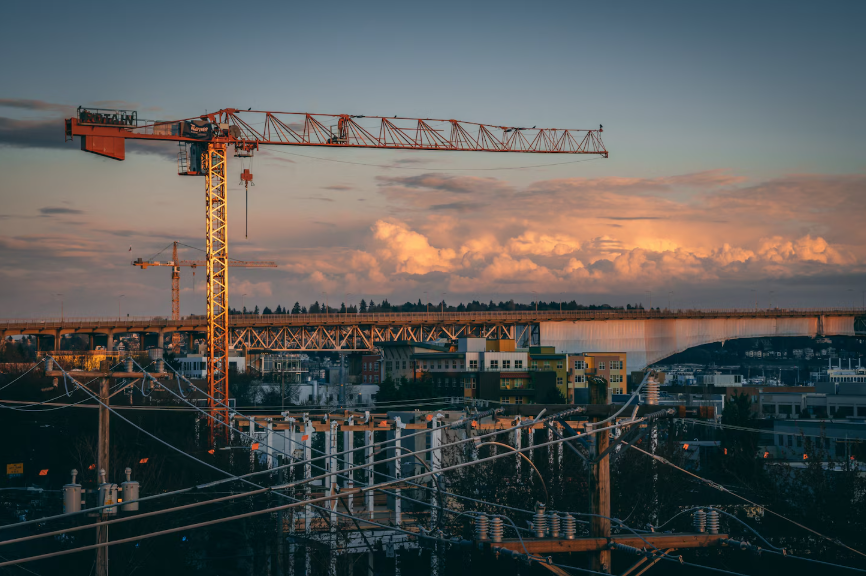 Construction site with workers and heavy equipment